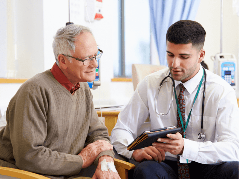 Doctor showing results to patient